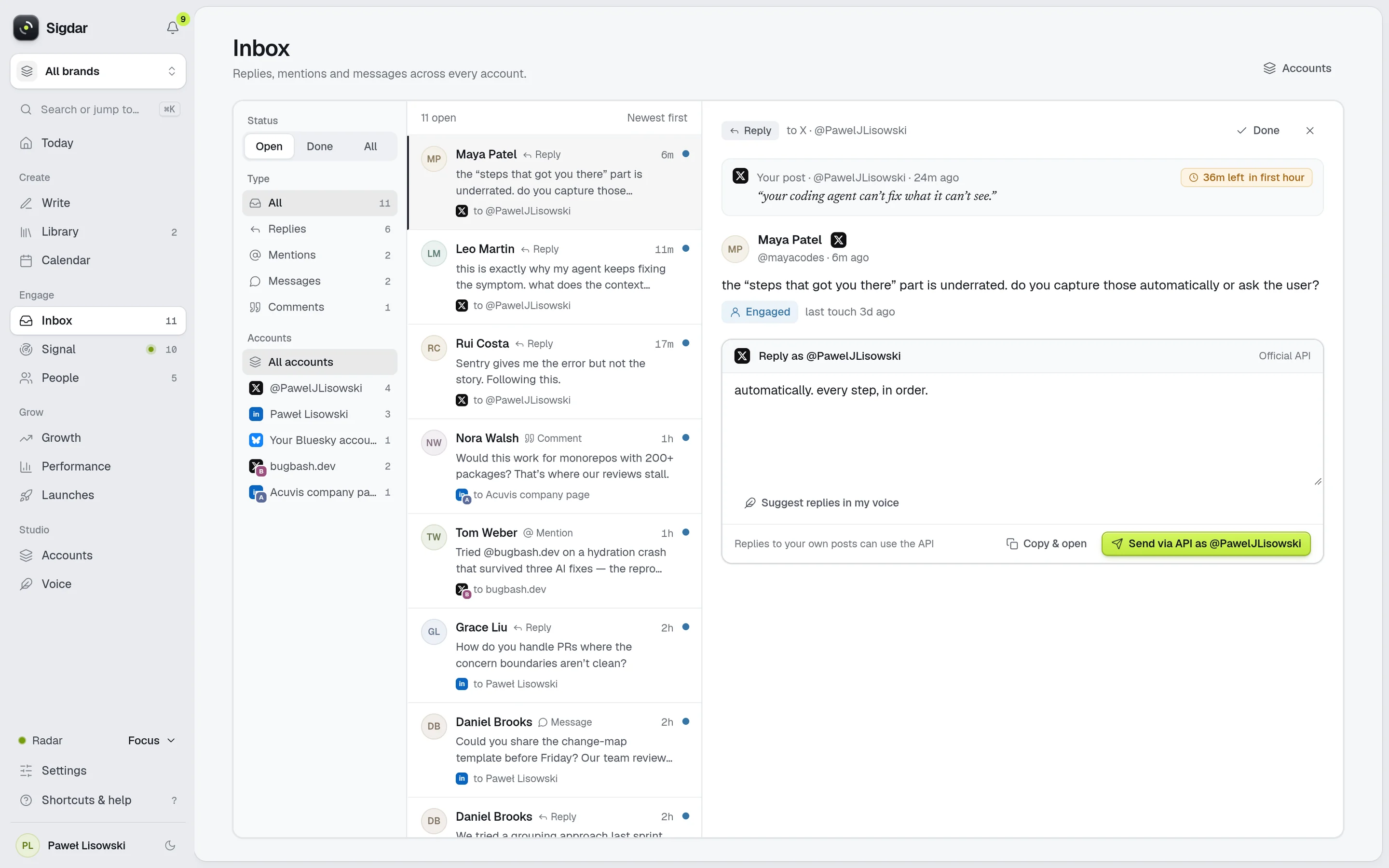 Sigdar’s unified inbox: filters by status, type and account, eleven open replies, mentions and messages across several accounts, and an open reply to the owner’s X post with 36 minutes left in its first hour and a drafted answer ready to send via the API.